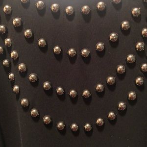 Elegant, black Evan Picone dress with beaded front.